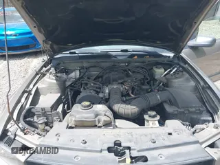 2005 Ford Mustang Deluxe z VIN 1ZVFT80N355160005, wystawiony jako IAAI lot #42288228 z przebiegiem 152 140 mil mil oraz . Historia ofert i sprzedaży dostępna na DreamBid. Obrazek 10.