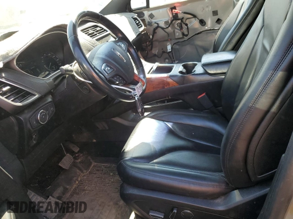 2017 Lincoln MKX Select with VIN 2LMPJ8KP2HBL41219, listed as a Copart auction lot 71245974 with 77,145 mi miles and Salvage Title. Bid and sale history available at carsss.com. Image 7.