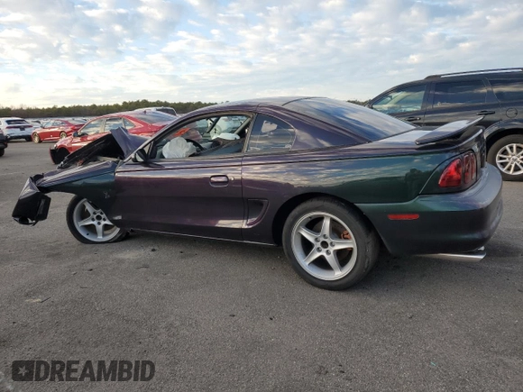 1996 Ford Mustang Cobra with VIN 1FALP47V8TF171331, listed as a Copart auction lot 83771084 with 0 mi miles and Salvage Title. Bid and sale history available at carsss.com. Image 2.