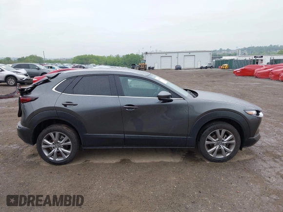 2023 Mazda CX-30 S Preferred z VIN 3MVDMBCM5PM576771, wystawiony jako IAAI lot #42244842 z przebiegiem 14 814 mil mil oraz . Historia ofert i sprzedaży dostępna na DreamBid. Obrazek 13.