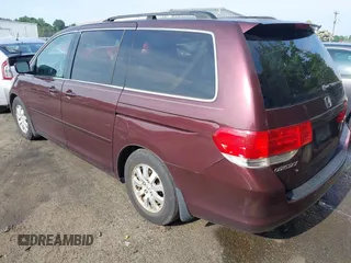 2010 Honda Odyssey EX with VIN 5FNRL3H59AB103405, listed as a IAAI auction lot 42442253 with 129,784 mi miles and . Bid and sale history available at DreamBid. Image 3.