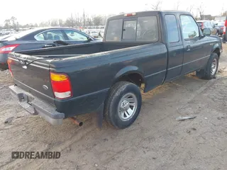 1999 Ford Ranger XLT with VIN 1FTYR14X0XPB77848, listed as a IAAI auction lot 41521029 with 139,595 mi miles. Bid and sale history available at carsss.com. Image 4.