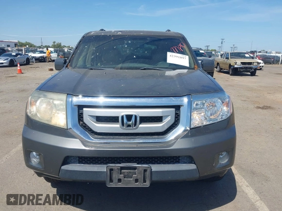 2009 Honda Pilot EX-L z VIN 5FNYF48529B038952, wystawiony jako IAAI lot #42391897 z przebiegiem 228 810 mil mil oraz . Historia ofert i sprzedaży dostępna na DreamBid. Obrazek 6.