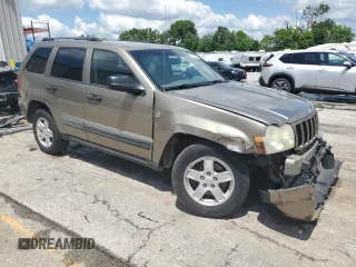 2005 Jeep Grand Cherokee Laredo with VIN 1J4HR48N65C608296, listed as a Copart auction lot 58862875 with 168,421 mi miles and Salvage title. Bid and sale history available at DreamBid. Image 4.
