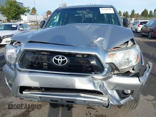 2014 Toyota Tacoma PreRunner with VIN 3TMJU4GN0EM163253, listed as a IAAI auction lot 41559780 with 155,883 mi miles. Bid and sale history available at carsss.com. Image 6.