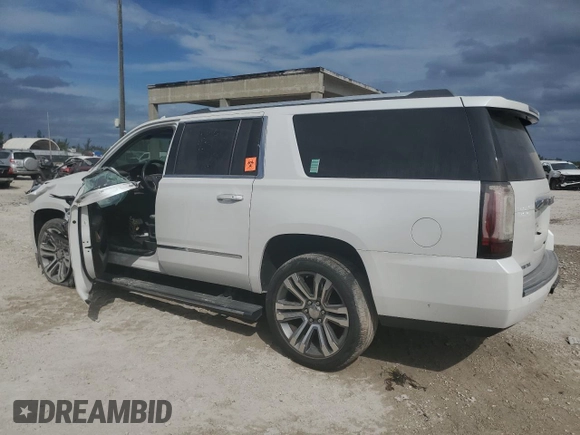 2019 GMC Yukon XL Denali with VIN 1GKS1HKJ3KR251642, listed as a Copart auction lot 76199674 with 0 mi miles and Salvage Title. Bid and sale history available at carsss.com. Image 2.
