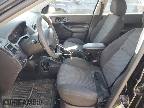 2007 Ford Focus S z VIN 1FAHP37N07W161088, wystawiony jako Copart lot #54140415 z przebiegiem 241 367 mil mil oraz Szkoda całkowita • Salvage title. Historia ofert i sprzedaży dostępna na DreamBid. Obrazek 7.