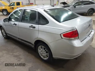 2011 Ford Focus SE with VIN 1FAHP3FN1BW120916, listed as a IAAI auction lot 42106878 with 107,166 mi miles. Bid and sale history available at carsss.com. Image 3.