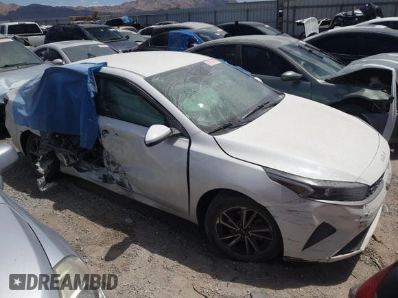 2022 Kia Forte LXS with VIN 3KPF24AD0NE431059, listed as a Copart auction lot 48265445 with 32,896 mi miles and Salvage Title. Bid and sale history available at DreamBid. Image 4.