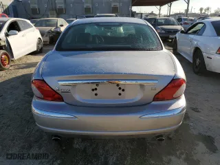 2005 Jaguar X-Type 3.0L with VIN SAJWA51C55WE31701, listed as a Copart auction lot 82908594 with 186,332 mi miles and Salvage Title. Bid and sale history available at carsss.com. Image 6.