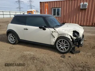 2013 MINI Hardtop S with VIN WMWSV3C54DT478670, listed as a Copart auction lot 52710445 with 58,974 mi miles and Salvage title. Bid and sale history available at DreamBid. Image 4.