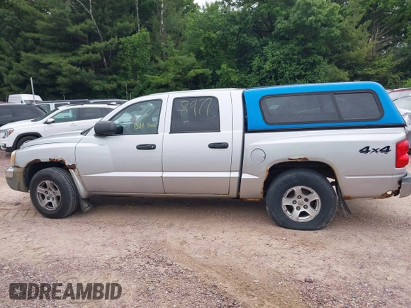 2005 Dodge Dakota SLT with VIN 1D7HW48N65S199887, listed as a IAAI auction lot 42508977 with 192,330 mi miles and . Bid and sale history available at DreamBid. Image 13.