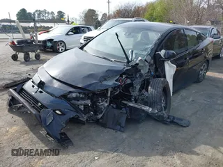 2020 Toyota Prius LE z VIN JTDKARFPXL3155639, wystawiony jako IAAI lot #41845001 z przebiegiem Nie podano mil oraz . Historia ofert i sprzedaży dostępna na DreamBid. Obrazek 17.