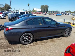 2023 BMW 5 Series 530i with VIN WBA53BH08PCL21884, listed as a IAAI auction lot 41991227 with 30,171 mi miles and . Bid and sale history available at DreamBid. Image 14.