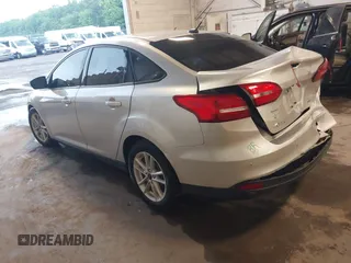 2016 Ford Focus SE z VIN 1FADP3F24GL393913, wystawiony jako IAAI lot #42640803 z przebiegiem 89 547 mil mil oraz . Historia ofert i sprzedaży dostępna na DreamBid. Obrazek 3.