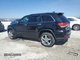 2018 Jeep Grand Cherokee Limited with VIN 1C4RJFBGXJC416963, listed as a Copart auction lot 55982075 with 137,020 mi miles and Clean title. Bid and sale history available at DreamBid. Image 2.