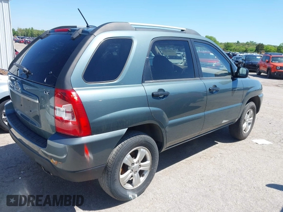 2009 Kia Sportage LX with VIN KNDJF724497602223, listed as a IAAI auction lot 42085415 with 91,105 mi miles. Bid and sale history available at carsss.com. Image 4.
