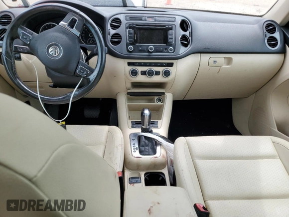 2013 Volkswagen Tiguan SE z VIN WVGAV7AXXDW523728, wystawiony jako Copart lot #64116173 z przebiegiem 116 336 mil mil oraz Szkoda całkowita • Salvage title. Historia ofert i sprzedaży dostępna na DreamBid. Obrazek 8.