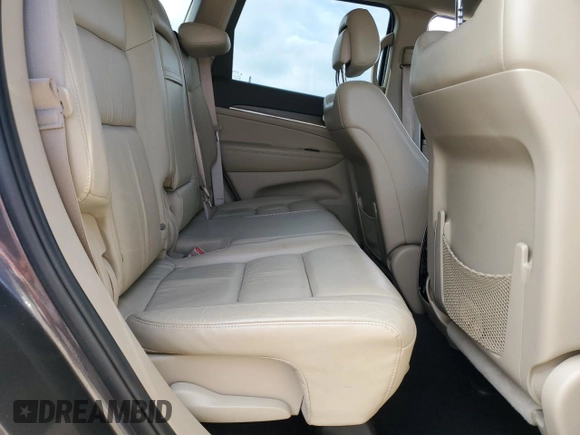 2016 Jeep Grand Cherokee Limited z VIN 1C4RJFBG2GC457581, wystawiony jako Copart lot #64200815 z przebiegiem 71 808 mil mil oraz Szkoda całkowita • Salvage title. Historia ofert i sprzedaży dostępna na DreamBid. Obrazek 11.