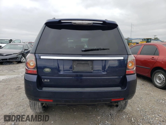 2014 Land Rover LR2 z VIN SALFP2BG7EH383805, wystawiony jako Copart lot #85239384 z przebiegiem 162 989 mil mil oraz Szkoda całkowita • Salvage title. Historia ofert i sprzedaży dostępna na DreamBid. Obrazek 6.