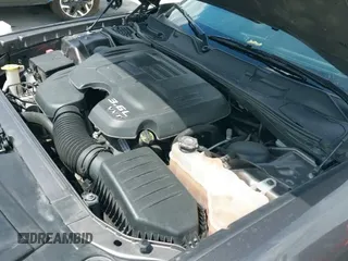 2021 Dodge Challenger SXT z VIN 2C3CDZAG2MH627290, wystawiony jako IAAI lot #42442041 z przebiegiem 72 233 mil mil oraz . Historia ofert i sprzedaży dostępna na DreamBid. Obrazek 24.