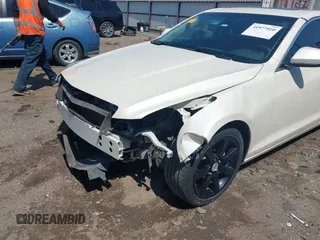 2014 Cadillac ATS Standard RWD with VIN 1G6AA5RA5E0161724, listed as a IAAI auction lot 41977910 with 81,205 mi miles and . Bid and sale history available at DreamBid. Image 6.