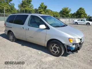 2003 Toyota Sienna LE with VIN 4T3ZF13C73U534999, listed as a Copart auction lot 70594794 with 296,433 mi miles and Salvage Title. Bid and sale history available at carsss.com. Image 4.