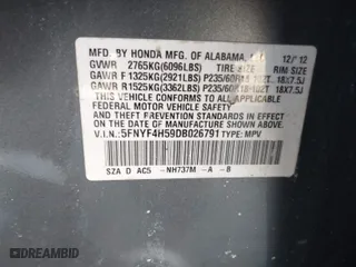 2013 Honda Pilot EX-L with VIN 5FNYF4H59DB026791, listed as a IAAI auction lot 41393791 with 110,935 mi miles. Bid and sale history available at carsss.com. Image 9.