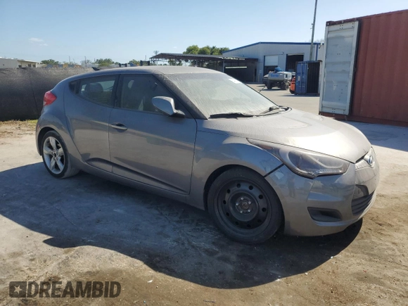 2012 Hyundai Veloster w/Black Int z VIN KMHTC6AD4CU046609, wystawiony jako Copart lot #54888045 z przebiegiem 152 997 mil mil oraz Szkoda całkowita • Salvage title. Historia ofert i sprzedaży dostępna na DreamBid. Obrazek 4.