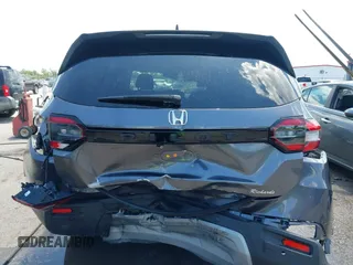 2025 Honda Pilot EX-L z VIN 5FNYG2H43SB010172, wystawiony jako IAAI lot #42262312 z przebiegiem 9 853 mil mil oraz . Historia ofert i sprzedaży dostępna na DreamBid. Obrazek 16.