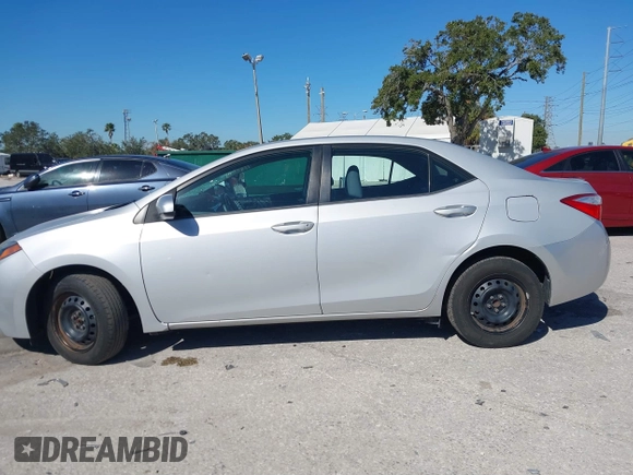 2014 Toyota Corolla L with VIN 2T1BURHE5EC006925, listed as a IAAI auction lot 40917569 with 130,761 mi miles and . Bid and sale history available at DreamBid. Image 14.