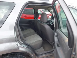 2006 Ford Escape XLS with VIN 1FMYU92ZX6KB10330, listed as a IAAI auction lot 41855529 with 249,548 mi miles. Bid and sale history available at carsss.com. Image 8.