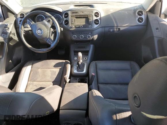 2014 Volkswagen Tiguan SE with VIN WVGAV3AX9EW611860, listed as a Copart auction lot 74431754 with 116,022 mi miles and Salvage title. Bid and sale history available at DreamBid. Image 8.