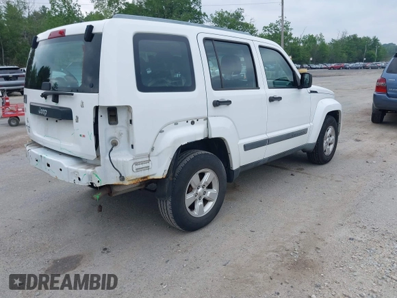 2011 Jeep Liberty Sport Jet z VIN 1J4PN2GK3BW579854, wystawiony jako IAAI lot #42391823 z przebiegiem 180 558 mil mil oraz . Historia ofert i sprzedaży dostępna na DreamBid. Obrazek 4.