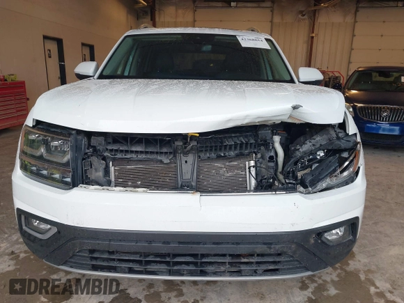 2018 Volkswagen Atlas SEL Premium with VIN 1V2NR2CA3JC594822, listed as a IAAI auction lot 42368854 with 60,688 mi miles and . Bid and sale history available at DreamBid. Image 6.