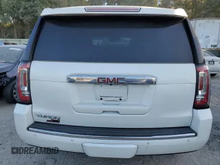 2019 GMC Yukon Denali with VIN 1GKS1CKJ8KR353280, listed as a Copart auction lot 77316454 with 74,476 mi miles and Salvage Title. Bid and sale history available at carsss.com. Image 6.