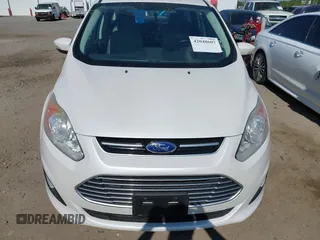 2013 Ford C-Max SE z VIN 1FADP5AU6DL524825, wystawiony jako IAAI lot #42048607 z przebiegiem 83 656 mil mil oraz . Historia ofert i sprzedaży dostępna na DreamBid. Obrazek 12.