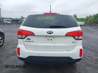 2015 Kia Sorento LX with VIN 5XYKTCA63FG586054, listed as a IAAI auction lot 42246543 with 159,427 mi miles and . Bid and sale history available at DreamBid. Image 16.