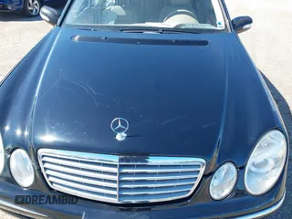 2006 Mercedes-Benz E-Class 3.5L with VIN WDBUF87JX6X181863, listed as a IAAI auction lot 41884272 with 195,315 mi miles. Bid and sale history available at carsss.com. Image 10.