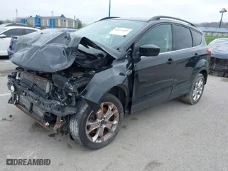 2016 Ford Escape SE with VIN 1FMCU9GX9GUA62830, listed as a IAAI auction lot 42014409 with 1 mi miles. Bid and sale history available at carsss.com. Image 2.