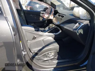 2024 Jaguar I-Pace R-Dynamic HSE z VIN SADHM2S10R1632727, wystawiony jako IAAI lot #41670704 z przebiegiem 4110 mil mil oraz . Historia ofert i sprzedaży dostępna na DreamBid. Obrazek 5.