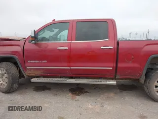 2019 GMC Sierra 2500HD Denali with VIN 1GT12SEYXKF218861, listed as a IAAI auction lot 41176336 with 130,225 mi miles. Bid and sale history available at carsss.com. Image 14.