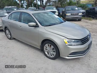 2016 Volkswagen Jetta Sedan 1.4T SE with VIN 3VWD67AJ9GM321104, listed as a IAAI auction lot 40633152 with 126,335 mi miles. Bid and sale history available at carsss.com. Image 1.