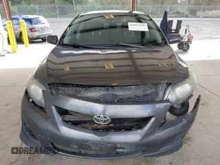2009 Toyota Corolla with VIN 1NXBU40E29Z028660, listed as a IAAI auction lot 42025186 with 218,285 mi miles. Bid and sale history available at carsss.com. Image 12.