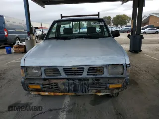 1995 Nissan Frontier with VIN 1N6SD11S3SC379478, listed as a Copart auction lot 52209415 with 21,068 mi miles and Salvage title. Bid and sale history available at DreamBid. Image 5.