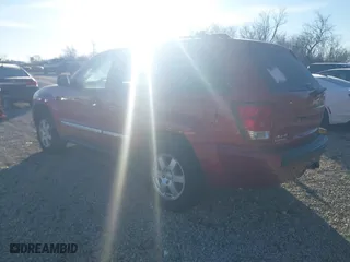 2010 Jeep Grand Cherokee Laredo with VIN 1J4PR4GK2AC135011, listed as a IAAI auction lot 41589996 with 111,536 mi miles. Bid and sale history available at carsss.com. Image 3.
