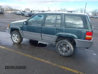 1993 Jeep Grand Cherokee Laredo with VIN 1J4GZ58Y9PC583439, listed as a IAAI auction lot 41794732 with 211,691 mi miles and . Bid and sale history available at DreamBid. Image 3.