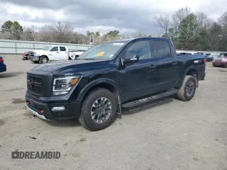 2024 Nissan Titan Pro-4X with VIN 1N6AA1ED3RN116454, listed as a Copart auction lot 43611905 with 8,563 mi miles and Salvage title. Bid and sale history available at DreamBid. Image 1.