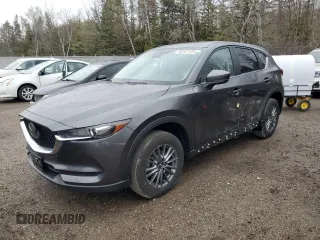 2021 Mazda CX-5 Touring z VIN JM3KFBCM6M1124508, wystawiony jako Copart lot #50167135 z przebiegiem 46 233 mil mil oraz Czysty tytuł • Clean title. Historia ofert i sprzedaży dostępna na DreamBid. Obrazek 1.