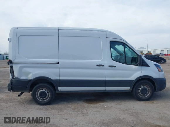 2021 Ford Transit Cargo with VIN 1FTBR1C89MKA03687, listed as a IAAI auction lot 41791299 with 116,341 mi miles and . Bid and sale history available at DreamBid. Image 12.